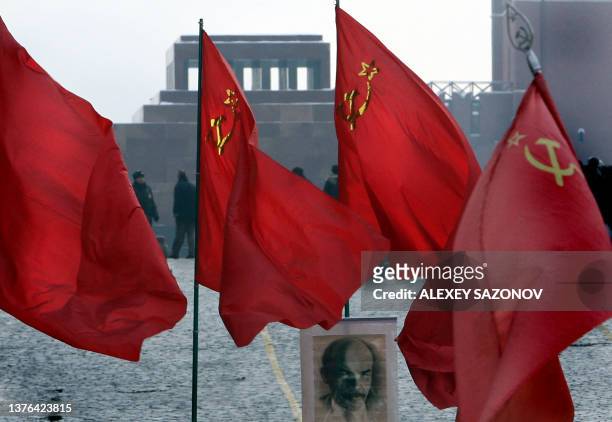 Russian Communist supporters gather in front of the mausoleum of former Soviet leader Vladimir Lenin in Red square in Moscow on January 21 marking...