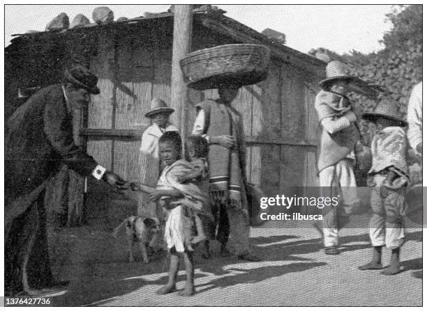 antique travel photographs of mexico: children - poor family stock illustrations