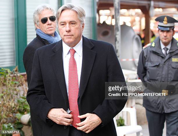 Ambassador to Italy David Torne walk in the village of the Isola del Giglio where the stricken cruise liner Costa Concordia lying aground on January...