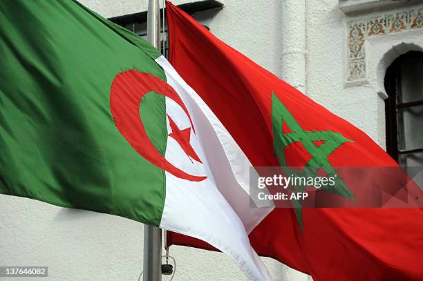 The flags of Algeria and Morocco flutter as Algerian president greets Moroccan Foreign Minister on January 24, 2012 in Algiers. Moroccan Foreign...