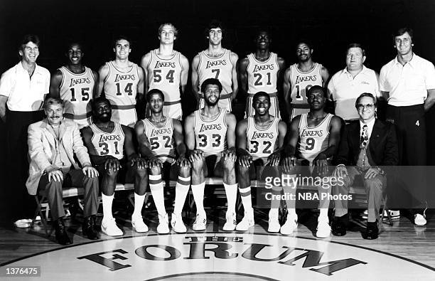 The World Champions of basketball Los Angeles Lakers pose for a team portrait seated : Chairman of the Board Dr. Jerry Buss, Spencer Haywood, Jamaal...