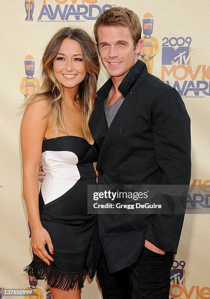 Cam Gigandet and Dominique Geisendorff arrive for the 2009 MTV Movie Awards at the Gibson Amphitheater in Universal City, California on May 31, 2009.