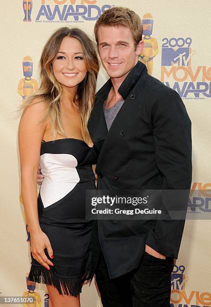 Cam Gigandet and Dominique Geisendorff arrive for the 2009 MTV Movie Awards at the Gibson Amphitheater in Universal City, California on May 31, 2009.