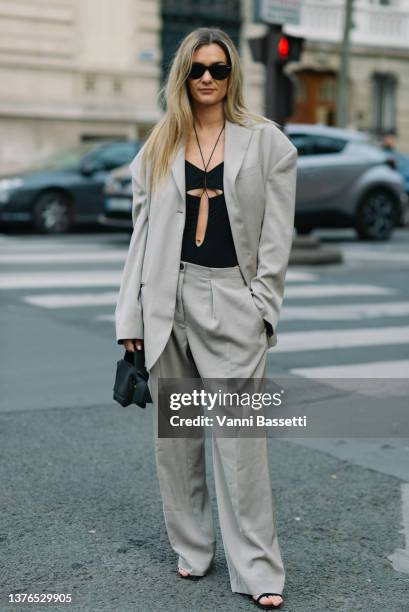 Anne Laure Mais poses wearing Acne Studios before the Acne Studios show at the Lycee Carnot during Paris Fashion Week - Womenswear F/W 2022-2023 on...