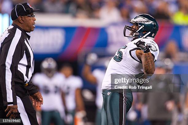 Defensive end Juqua Parker of the Philadelphia Eagles reacts after a tackle during the game against the New York Giants at MetLife Stadium on...