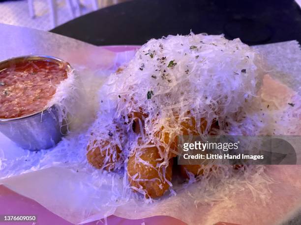 mozzarella sticks with shaved parmesan - shaved parmesan stock pictures, royalty-free photos & images