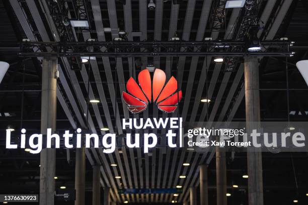 Logo sits illuminated at the Huawei Technologies Co. Booth on day 3 of the GSMA Mobile World Congress on March 02, 2022 in Barcelona, Spain. This...