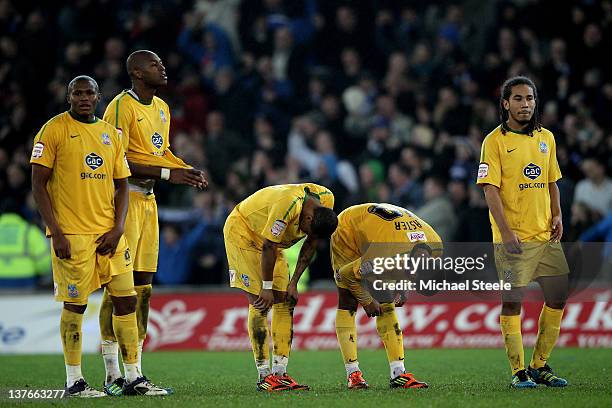 Dejected Crystal Palace players react following their team's 3-1 defeat in the penalty shootout during the Carling Cup Semi Final second leg match...