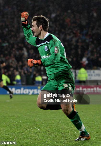 Goalkeeper Tom Heaton of Cardiff City celebrates as his team wins 3-1 in the penalty shootout during the Carling Cup Semi Final second leg match...