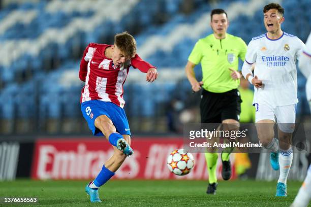 Pablo Barrios of Atletico de Madrid scores their team's third goal during the UEFA Youth League Round Of Sixteen match between Real Madrid and...