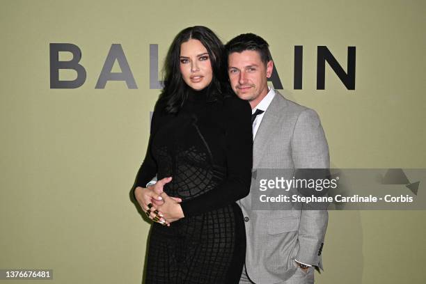Adriana Lima and Andre Lemmers attend the Balmain Womenswear Fall/Winter 2022/2023 show as part of Paris Fashion Week on March 02, 2022 in Paris,...