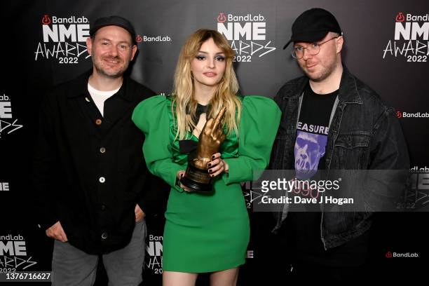 Martin Doherty, Lauren Mayberry and Iain Cook of Chvrches with the award for Best Song by a UK Artist at O2 Academy Brixton on March 02, 2022 in...