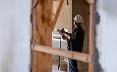 Construction worker supervising the development of a construction site