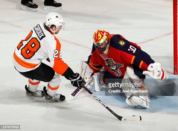 Claude Giroux of the Philadelphia Flyers scores the winning goal during the shoot out past goaltender Scott Clemmensen the Florida Panthers on...