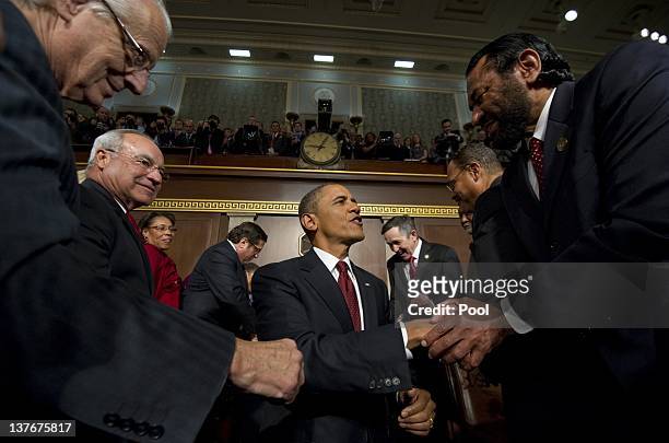 President Barack Obama arrives for his State of the Union address before a joint session of Congress on Capitol Hill January 24, 2012 in Washington,...