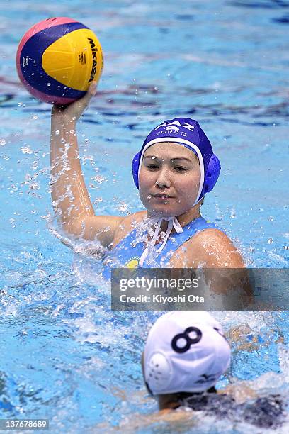 Aizhan Akilbayeva of Kazakhstan passes the ball during the Asian Water Polo Championships 2012 match between Japan and Kazakhstan at Chiba...