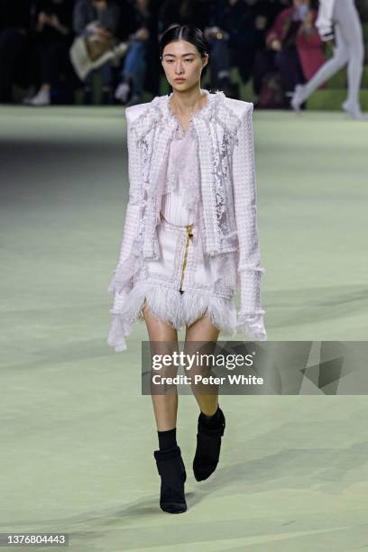 Model walks the runway during the Balmain Womenswear Fall/Winter 2022-2023 show at Carreaux Du Temple as part of Paris Fashion Week on March 02, 2022...