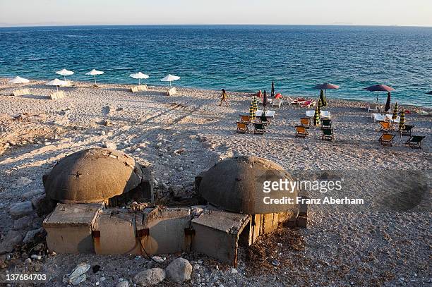 beach at dhermi, albania - bunker stock pictures, royalty-free photos & images