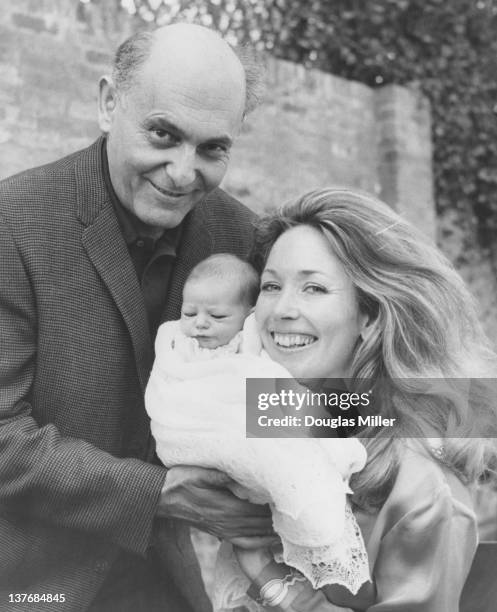 Hungarian-British orchestral and operatic conductor Georg Solti with his wife, TV presenter Valerie Pitts, and their one-week old daughter Gabrielle...