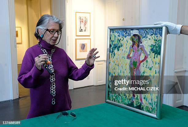 Meda Mladkova, Czech art patron looks at the painting named ''Kupka's Step-Daughter Andree'' by Czech painter and graphic artist Frantisek Kupka, on...