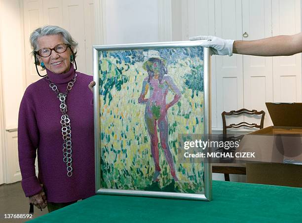 Meda Mladkova, Czech art patron poses next the painting named ''Kupka's Step-Daughter Andree'' by Czech painter and graphic artist Frantisek Kupka,...