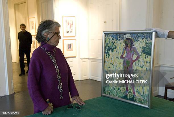 Meda Mladkova, Czech art patron looks at the painting named ''Kupka's Step-Daughter Andree'' by Czech painter and graphic artist Frantisek Kupka, on...