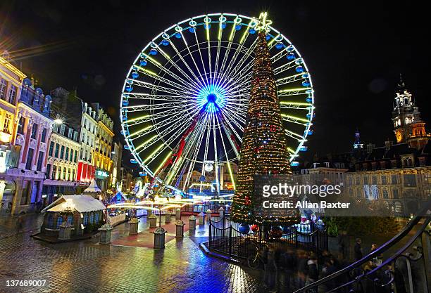 ferris wheel in central lille - france lille stock pictures, royalty-free photos & images