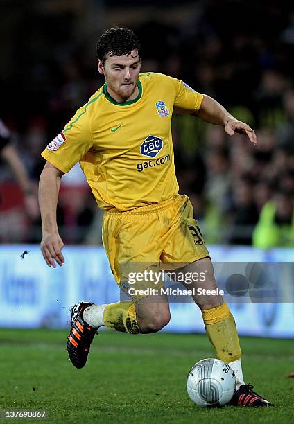 Mile Jedinak of Crystal Palace runs with the ball during the Carling Cup Semi Final second leg match between Cardiff City and Crystal Palace at...