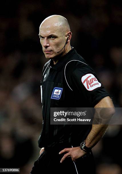 Referee Howard Webb in action during the Carling Cup Semi Final second leg match between Cardiff City and Crystal Palace at Cardiff City Stadium on...