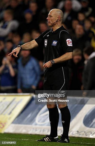 Referee Howard Webb in action during the Carling Cup Semi Final second leg match between Cardiff City and Crystal Palace at Cardiff City Stadium on...