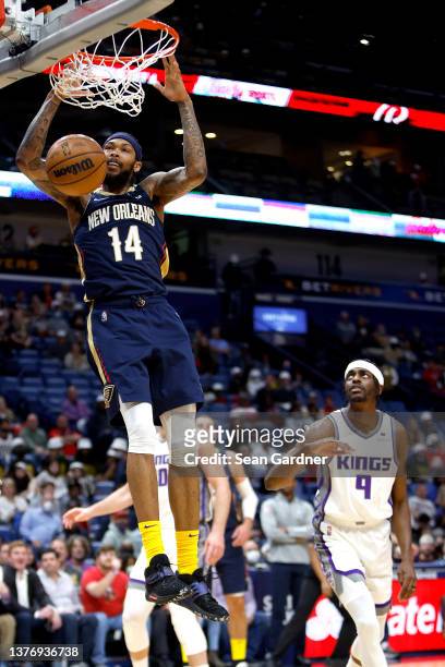 Brandon Ingram of the New Orleans Pelicans dunks the ball during the first quarter of an NBA game against the Sacramento Kings at Smoothie King...