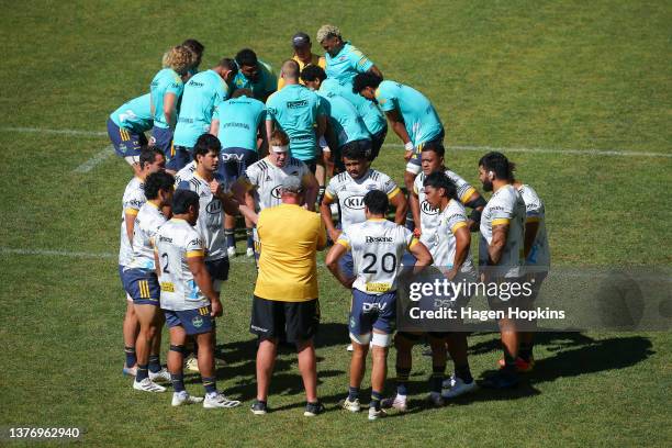 Players form huddles during a Hurricanes Super Rugby training session at Rugby League Park on March 03, 2022 in Wellington, New Zealand.