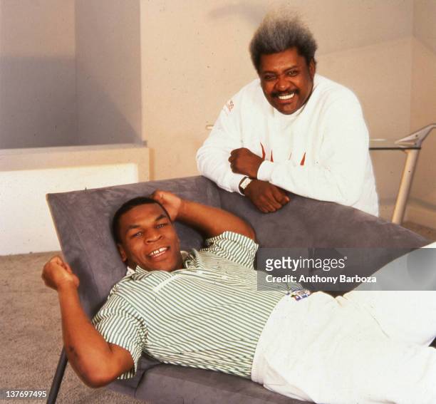 Portrait of American heavyweight boxer Mike Tyson and boxing promotor & businessman Don King, Los Angeles, California, May 1988.