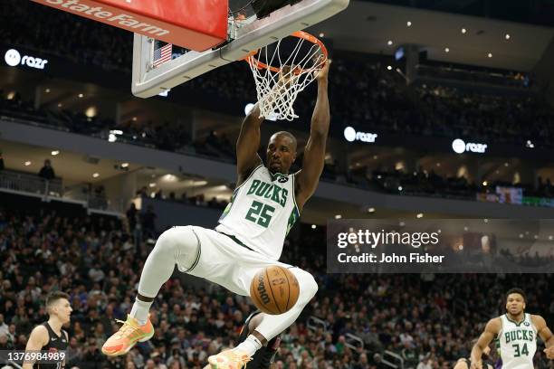 Serge Ibaka of the Milwaukee Bucks scores on a slam dunk during the first half of the game against the Miami Heat at Fiserv Forum on March 02, 2022...