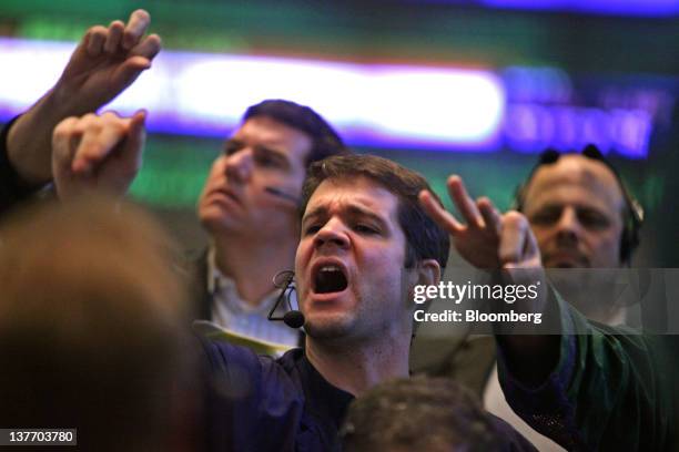 Traders work in the two-year and five-year U.S. Treasury note options pit on the floor of the CME Group's Chicago Board of Trade prior to the Federal...