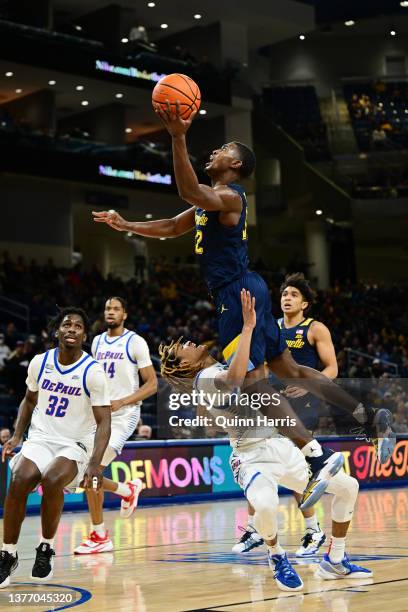 Darryl Morsell of the Marquette Golden Eagles is fouled shooting in the first half against Jalen Terry of the DePaul Blue Demons at Wintrust Arena on...