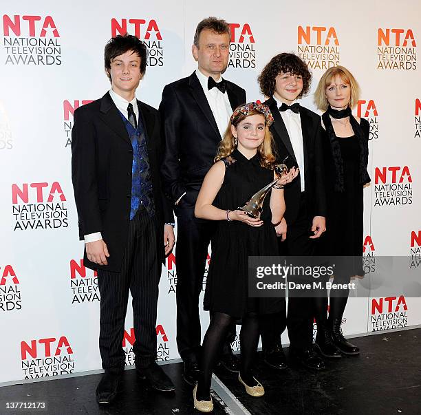 Winners of Situation Comedy Tyger Drew-Honey, Hugh Dennis, Ramona Marquez, Daniel Roche and Claire Skinner pose in front of the winners boards during...