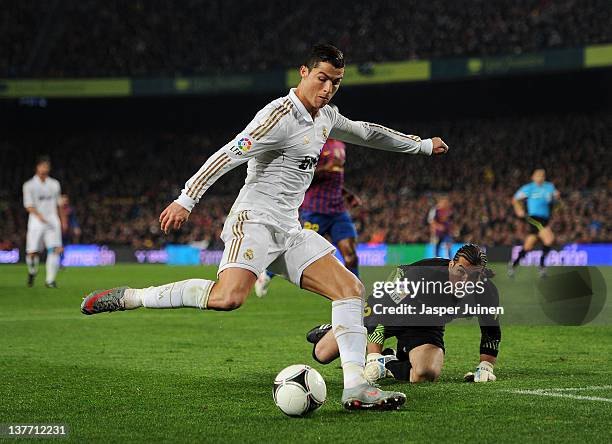 Cristiano Ronaldo of Real Madrid scores past Jose Pinto of FC Barcelona during the Copa del Rey quarter final second leg match between Barcelona and...