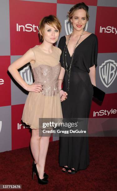 Emily Browning and Dakota Johnson arrive at the 12th Annual Warner Bros. And Instyle Post-Golden Globe Party at the Beverly Hilton Hotel on January...