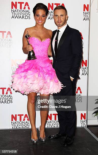 Tulisa Contostavlos and Gary Barlow pose in the press room at the National Television Awards 2012 at The O2 Arena on January 25th, 2012 in London,...