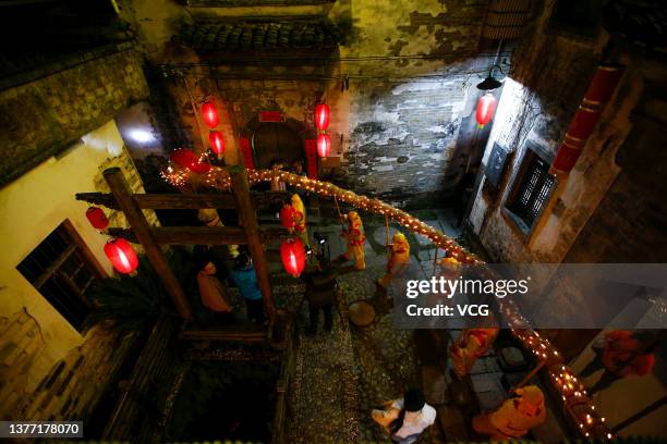 Villagers perform straw dragon dance to welcome Longtaitou Festival, or Dragon Head-Raising Day, on March 2, 2022 in Huangshan, Anhui Province of...