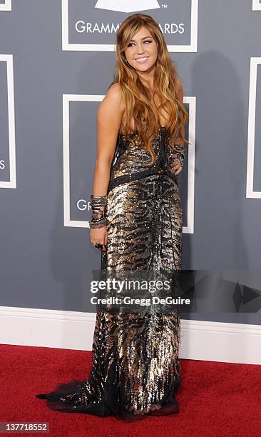 Miley Cyrus arrives for the 53rd Annual GRAMMY Awards at the Staples Center, February 13, 2011 in Los Angeles, California.
