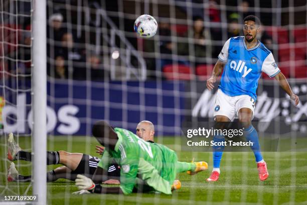 Michael Barrios of Charlotte FC shoots the ball against Bill Hamid of D.C. United during the second half of the MLS game at Audi Field on February...