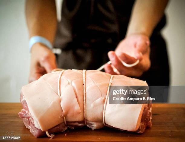 preparing pork roast! - roast pig stock pictures, royalty-free photos & images