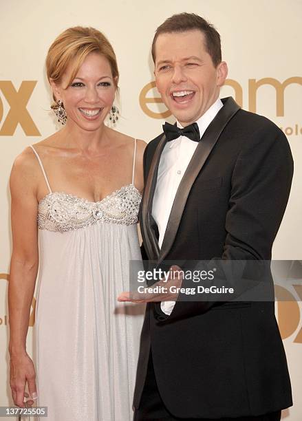 Jon Cryer and Lisa Joyner arrive at the Academy of Television Arts & Sciences 63rd Primetime Emmy Awards at Nokia Theatre L.A. Live on September 18,...