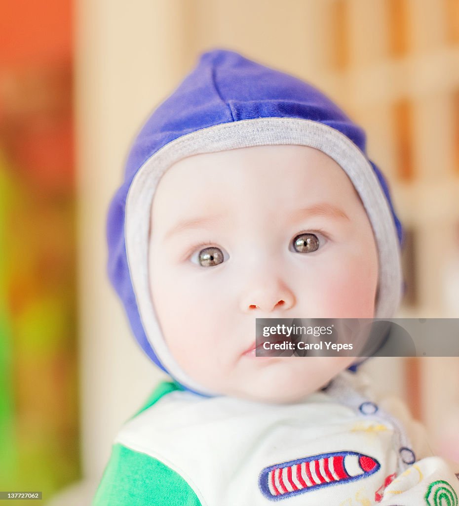 Little baby wearning blue hat