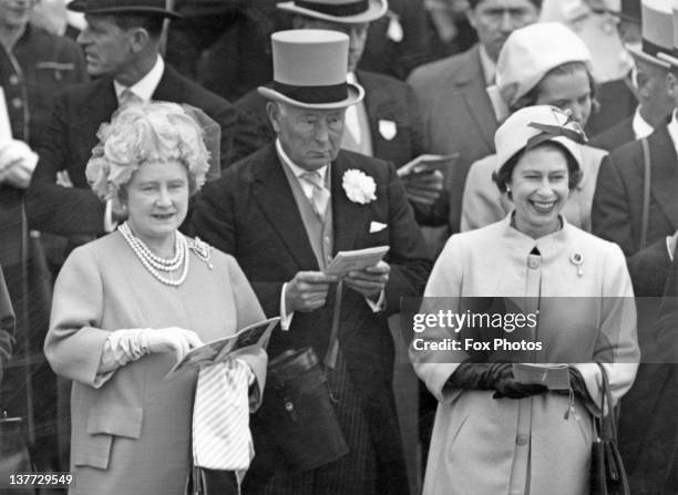 The Queen Mother , Bernard Fitzalan-Howard, 16th Duke of Norfolk and Queen Elizabeth II in the Royal enclosure at the Derby, Epsom Downs Racecourse,...