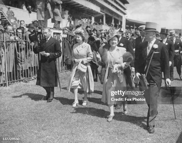 King George VI , Princess Elizabeth , Queen Elizabeth and Bernard Fitzalan-Howard, 16th Duke of Norfolk at the Oaks Stakes, Epsom Downs Racecourse,...