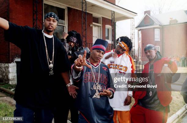 Rappers Nelly , Ali , group mascot Slo Down , rappers Murphy Lee and Kyjuan of St. Lunatics poses for photos during a break in filming their video...