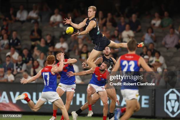 Tom De Koning of the Blues attempts to mark during the AFL AAMI Community Series match between the Carlton Blues and the Melbourne Demons at Marvel...